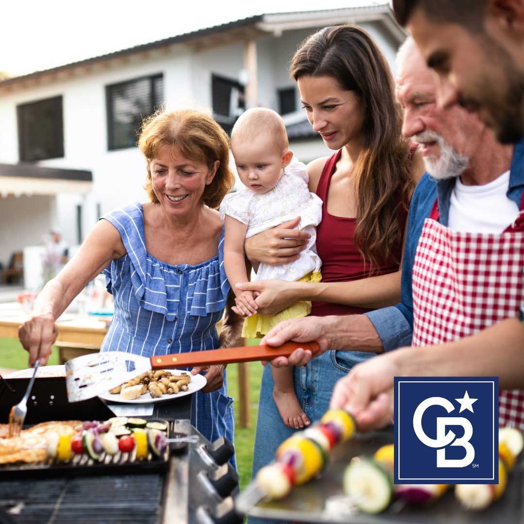 Family enjoying a backyard barbecue during yellow jacket season without pests nearby, showing a safe and relaxed outdoor gathering.