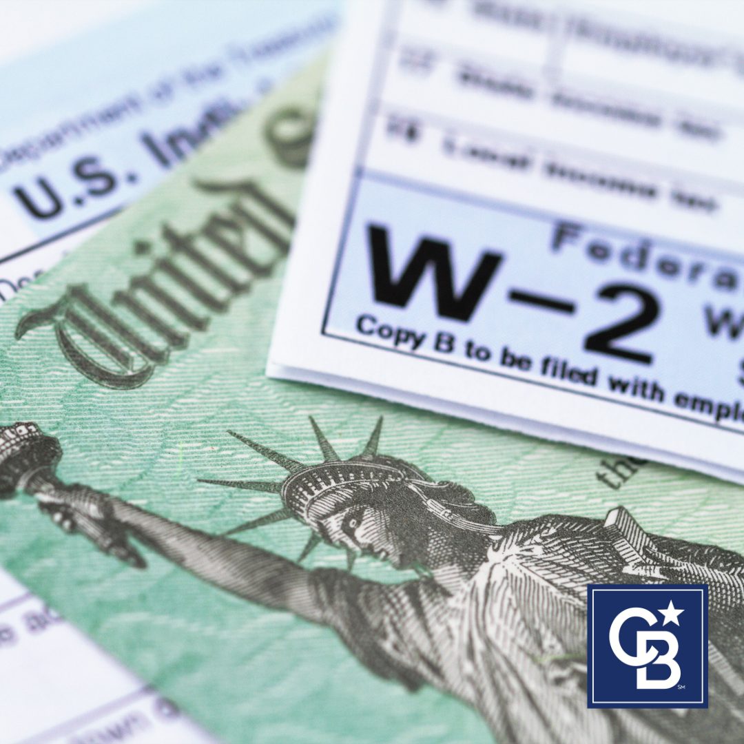 Tax forms on a table, representing updates to the SALT deduction for 2025.